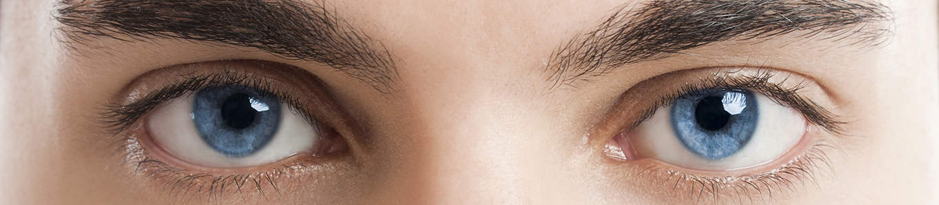 Close-up picture of blue eyes from a young man