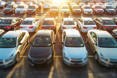 full parking lot and sundown | Parking Lot Slip and Fall Accidents