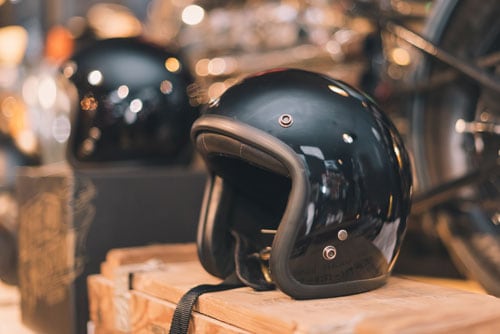 classic motorcycle helmet on display in store | Guide to Motorcycle Safety in Colorado