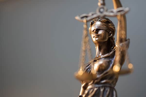 lady justice statue close up | Understanding Contingency Fees