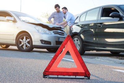 two drivers talking after fender bender | Delayed Symptoms after a Car Accident