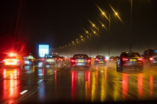 cars driving on a highway, raining | colorado the worst state for driving