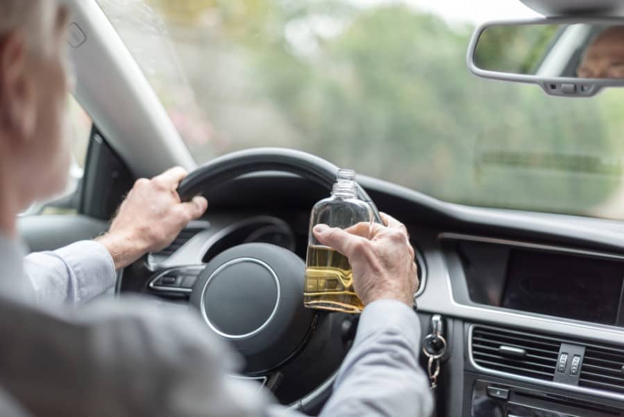 driver drinking alcohol while driving | Repeat Drunk Drivers