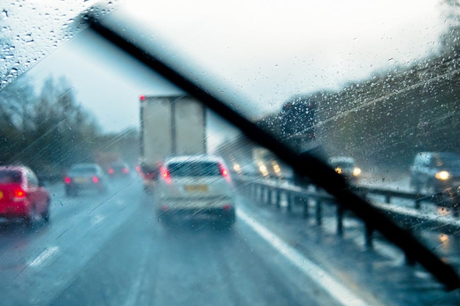 driving on the highway while raining | Light Rain Increases Risk of Traffic Fatalities